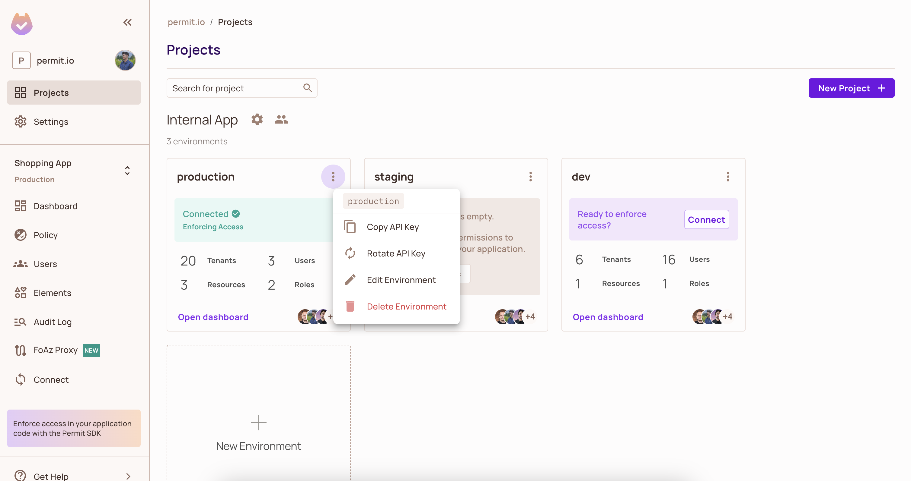 Projects screen with the three environment cards of the Internal App project and the environment menu open, listing the environment key production, Copy API Key, Rotate API Key, Edit Environment, and Delete Environment